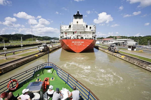 Panama, Panama Canal, Tanker and tourist boat in Miraflores Locks