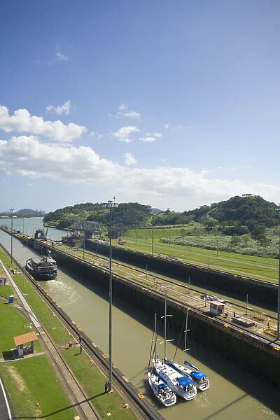 Panama, Panama Canal, Three Yachts tied up together in Miraflores Locks know as Tandam