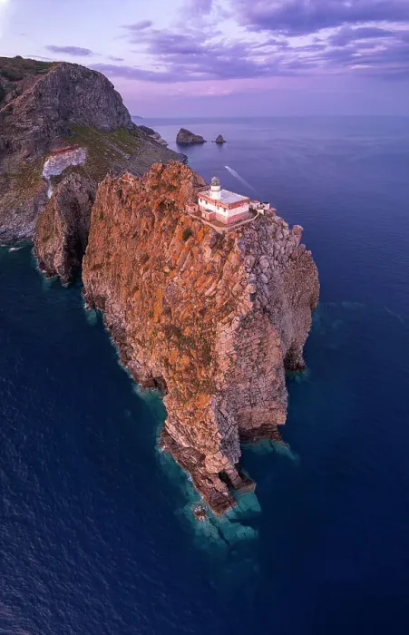 Framed Print : Panoramic aerial view of the lighthouse on top of a rocky cliff at dusk, Punta della Guardia, Ponza island, Pontine archipelago, Latium region, Italy Framed Print : Panoramic aerial view of the lighthouse on top of a rocky cliff at dusk, Punta della Guardia, Ponza island, Pontine archipelago, Latium region, Italy