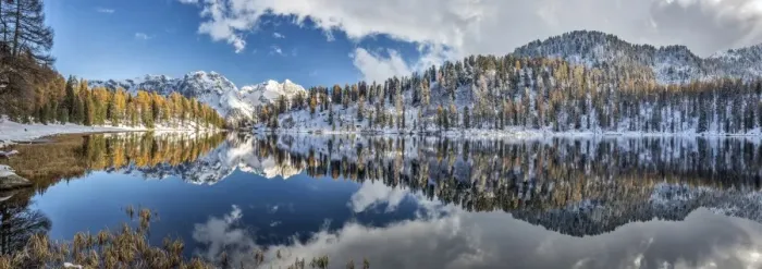 Framed Print : Panoramic shot of the Lake Malghette in autumn with Dolomites of Brenta in the background Framed Print : Panoramic shot of the Lake Malghette in autumn with Dolomites of Brenta in the background