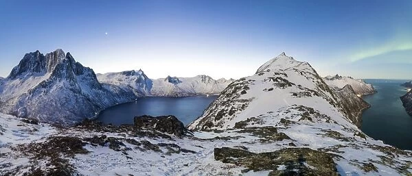 Panoramic view of the icy sea along the Mefjorden to Ornfjorden towards the peak