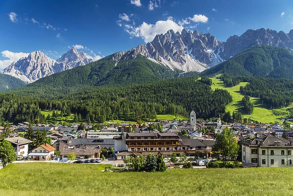 Panoramic view over San Candido Innichen with Dolomites behind, Alto Adige or South Tyrol