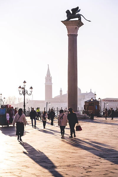 Paople crossing St. Mark square, Venice, Veneto, Italy