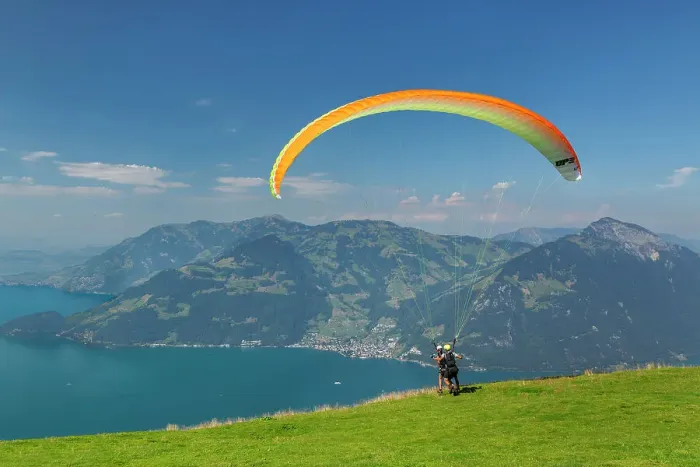Framed Print : Paraglider on Niederbauen Mountain, Lake Lucerne, Canton Uri, Switzerland Framed Print : Paraglider on Niederbauen Mountain, Lake Lucerne, Canton Uri, Switzerland