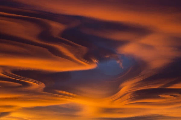 Particular lenticular cloud formation at sunset from Brianza, Lombardy, Italy