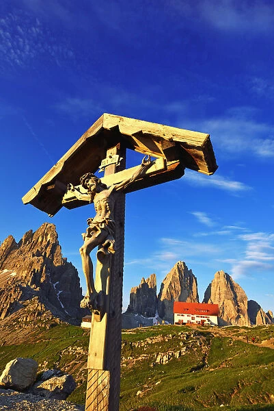 Three Peaks and Monte Paterno with Three Peaks Lodge and Jesus at the crossroads