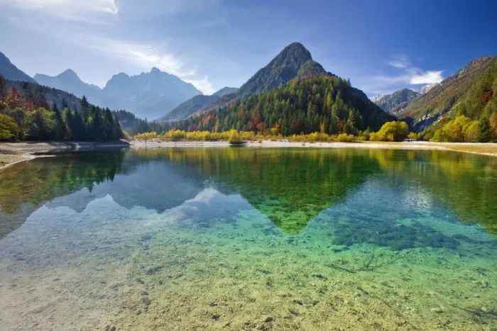 Framed Print : Peaks of Prisojnik and Razor reflected in pools beside the Velika Pisnca River in Autumn Framed Print : Peaks of Prisojnik and Razor reflected in pools beside the Velika Pisnca River in Autumn