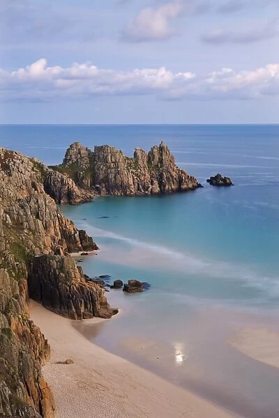 Pednvounder Beach and Logan Rock from the clifftops near Treen, Porthcurno, Cornwall, England