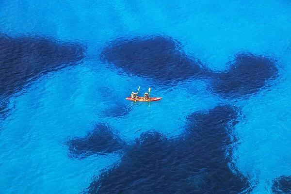 People canoeing near Cala Mitjana, Menorca; Balearic Islands; Spain; Europe