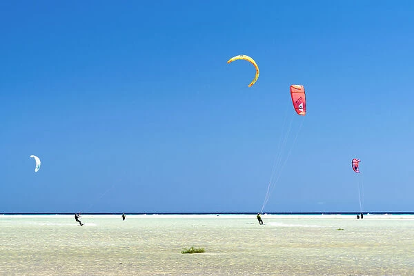 People enjoying kitesurfing at Sotavento beach (Playa de Sotavento de Jandia)