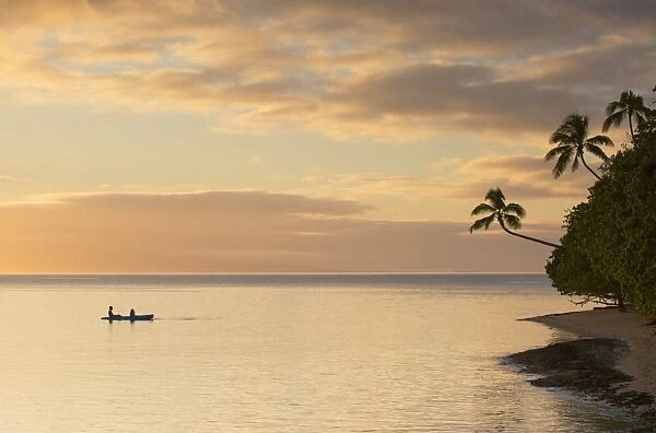 People kayaking at sunset, Leleuvia Island, Lomaiviti Islands, Fiji