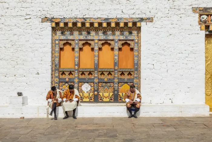 Framed Print : People sitting at the Punakha Tshechu (otherwise known as Punakha Festival) Framed Print : People sitting at the Punakha Tshechu (otherwise known as Punakha Festival)