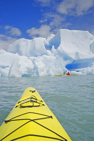 Person kayaking near icebergs, Lago Gray (Lake Gray  /  Lake Grey), Torres del Paine