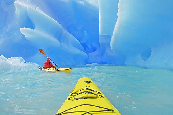 Person kayaking near icebergs, Lago Gray (Lake Gray) (Lake Grey), Torres del Paine