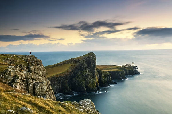 Person Overlooking Neist Point Lighthouse, Isle of Skye, Highland Region, Scotland
