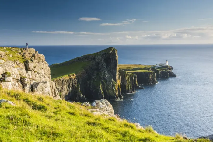 Framed Print : Person Overlooking Neist Point Lighthouse, Isle of Skye, Scotland Framed Print : Person Overlooking Neist Point Lighthouse, Isle of Skye, Scotland