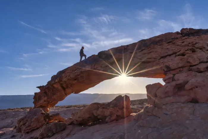 Framed Print : Person on Sunset Arch, Grand Staircase Escalante National Monument, Utah, USA Framed Print : Person on Sunset Arch, Grand Staircase Escalante National Monument, Utah, USA