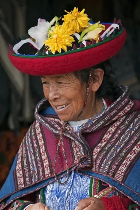Framed Print : Peru, An old woman in traditional Indian costume with her round, saucer-shaped hat decorated with fresh Framed Print : Peru, An old woman in traditional Indian costume with her round, saucer-shaped hat decorated with fresh
