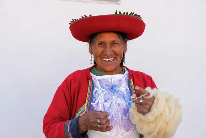 Framed Print : Peruvian woman in traditional dress winding up wool, Chinchero, Sacred Valley, Urubamba Province, Cusco Region, Peru Framed Print : Peruvian woman in traditional dress winding up wool, Chinchero, Sacred Valley, Urubamba Province, Cusco Region, Peru