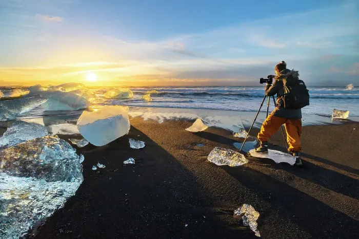 Framed Print : A photographer at Diamond Beach, Jokulsarlon, Diamond beach, Austurland, Iceland (MR)