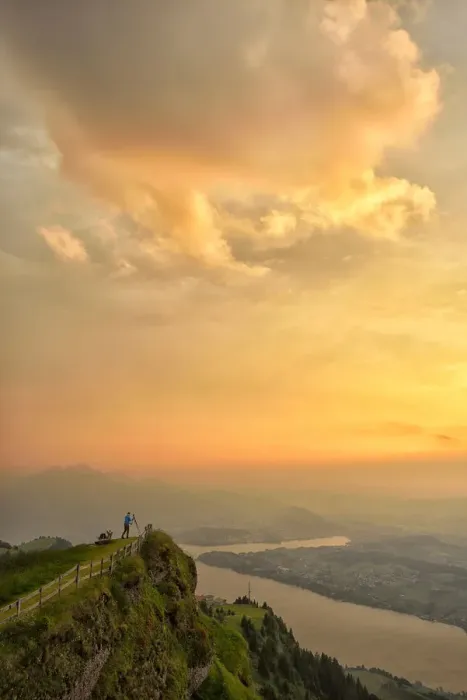 Framed Print : Photographer at sunset over lake Zug, On top of Mount Rigi, Switzerland, North-Eastern