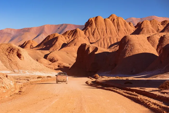 Framed Print : Pick-Up traveling on an empty road, Labyrinth Desert, Puna, Argentina