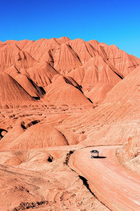 Framed Print : Pick-Up truck traveling on a desert road, Labyrinth Desert, Puna, Argentina