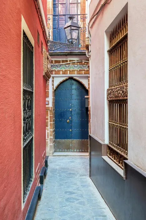 Framed Print : Picturesque alley in Santa Cruz district, Seville, Andalusia, Spain Framed Print : Picturesque alley in Santa Cruz district, Seville, Andalusia, Spain