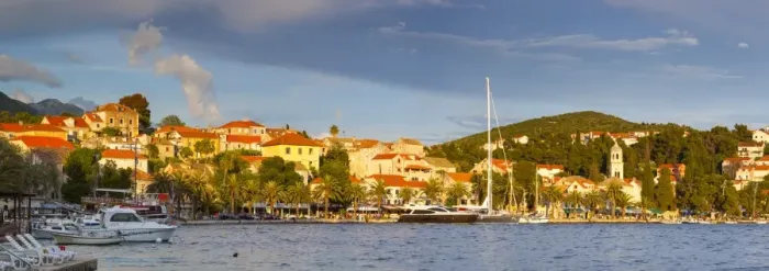 Framed Print : The picturesque harbor town of Cavtat illuminated at sunset, Cavtat, Dalmatia, Croatia