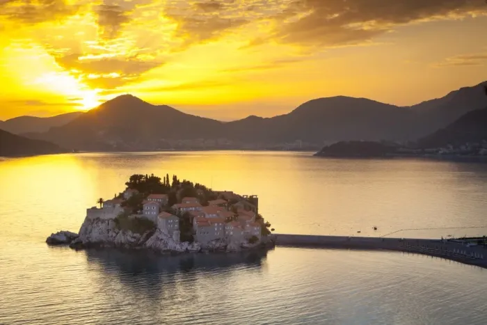 Framed Print : The picturesque island village of Sveti Stephan illuminated at sunset, Sveti Stephan Framed Print : The picturesque island village of Sveti Stephan illuminated at sunset, Sveti Stephan