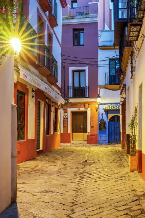 Framed Print : Picturesque street corner in Santa Cruz district, Seville, Andalusia, Spain Framed Print : Picturesque street corner in Santa Cruz district, Seville, Andalusia, Spain