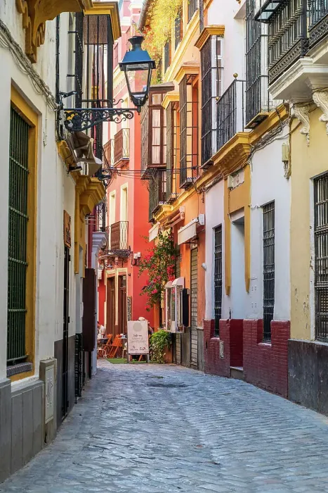 Framed Print : Picturesque street corner in Santa Cruz district, Seville, Andalusia, Spain Framed Print : Picturesque street corner in Santa Cruz district, Seville, Andalusia, Spain
