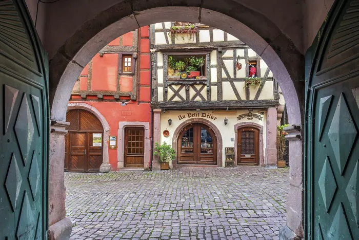 Framed Print : Picturesque street with traditional half-timbered houses, Riquewihr, Haut-Rhin, Alsace, Grand Est, France Framed Print : Picturesque street with traditional half-timbered houses, Riquewihr, Haut-Rhin, Alsace, Grand Est, France
