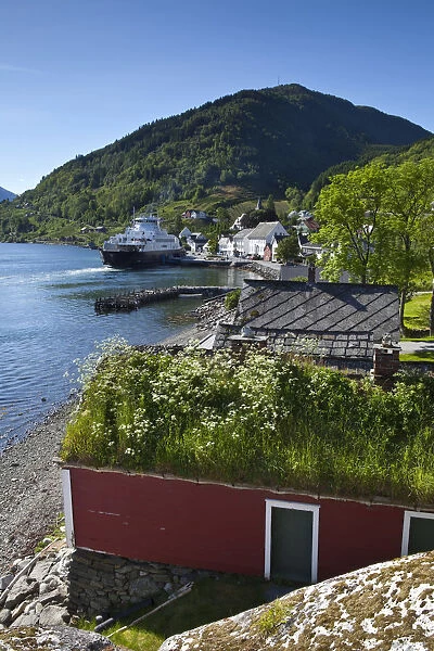 The picturesque village of Utne nestled into a little bay in the idyllic Hardangerfjord
