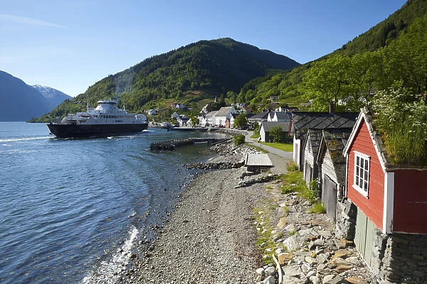 The picturesque village of Utne nestled into a little bay in the idyllic Hardangerfjord