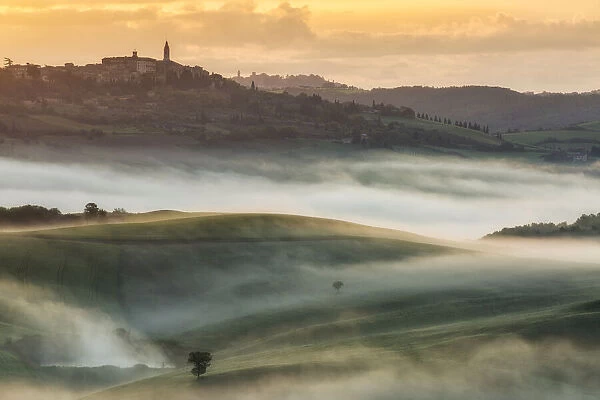 Pienza on a misty morning in the Val D Orcia, Tuscany Italy