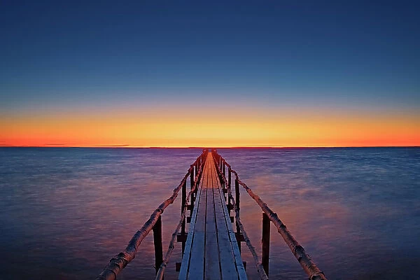 Pier (dock) on Lake Winnipeg at dawn Matlock, Manitoba, Canada