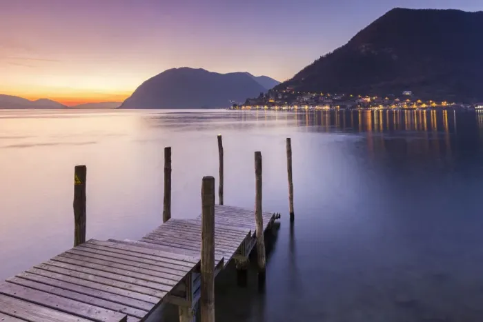 Framed Print : A pier in Sulzano, in front of Montisola and Peschiera Maraglio town during a winter Framed Print : A pier in Sulzano, in front of Montisola and Peschiera Maraglio town during a winter