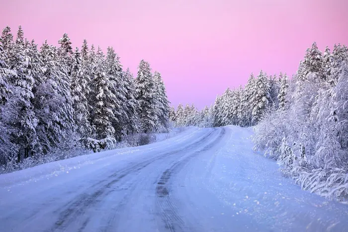 Framed Print : Pink arctic sunset over an empty frozen road in the middle of a snowy forest in winter, Iso Syote, Lapland, Finland Framed Print : Pink arctic sunset over an empty frozen road in the middle of a snowy forest in winter, Iso Syote, Lapland, Finland
