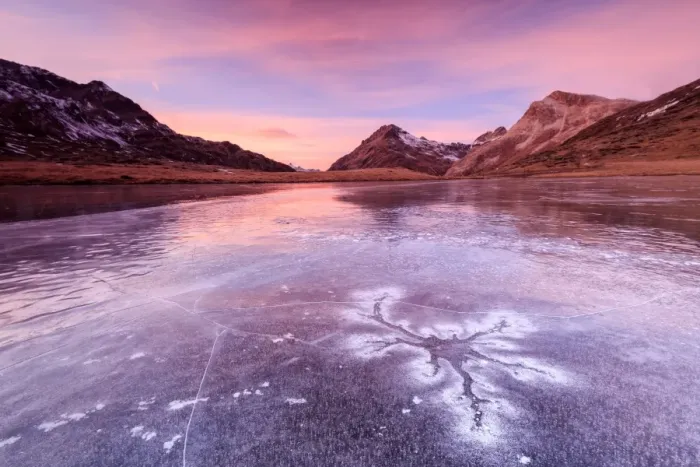 Framed Print : Pink sky at sunset frames the frozen surface of Lej Nair Bernina Pass Canton of Graubunden Framed Print : Pink sky at sunset frames the frozen surface of Lej Nair Bernina Pass Canton of Graubunden
