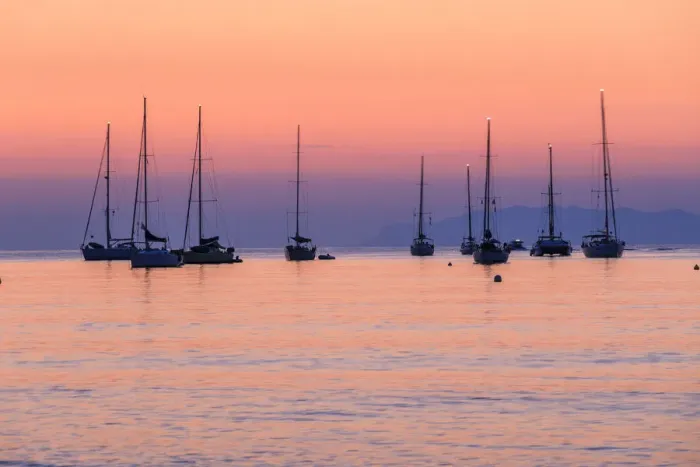 Framed Print : Pink sunrise over sailboats in the calm sea, Macinaggio, Cape Corse Framed Print : Pink sunrise over sailboats in the calm sea, Macinaggio, Cape Corse