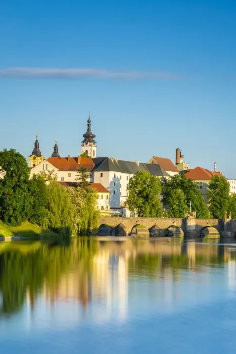Framed Print : Pisek Stone bridge over Otava River with Pisek Castle in background, Pisek, South Bohemian Region, Czech Republic Framed Print : Pisek Stone bridge over Otava River with Pisek Castle in background, Pisek, South Bohemian Region, Czech Republic