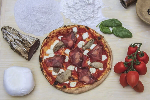 Pizza with mushrooms and bresaola. Lombardy. Italy. Europe