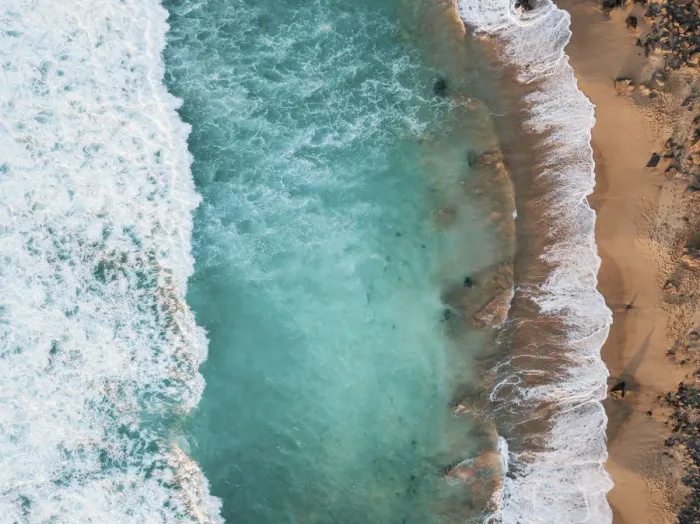 Framed Print : Playa del Aguila, El Cotillo, Fuerteventura. Aerial view directly above waves Framed Print : Playa del Aguila, El Cotillo, Fuerteventura. Aerial view directly above waves