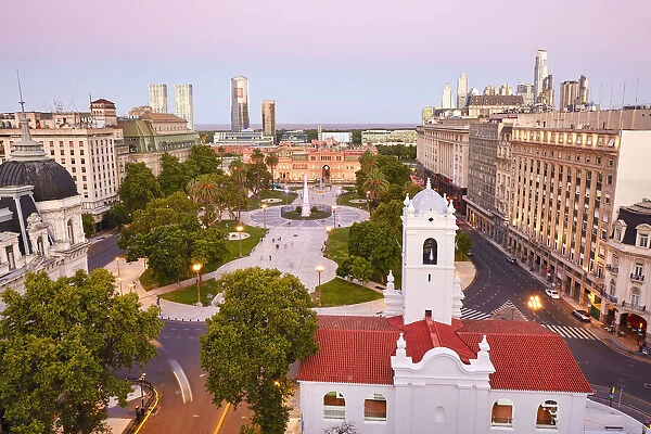 The Plaza de Mayo square at twilight with the Cabildo Museum in foreground and the Casa Rosada in background, Monserrat, Buenos Aires, Argentina