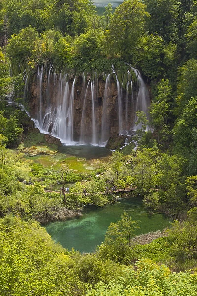 Plitvice National Park, Croatia. A waterfall and a lake into the national park in