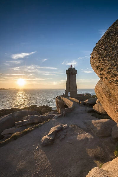Ploumanach lighthouse at sunset. Perros-Guirec, Cotes-d Armor, Brittany