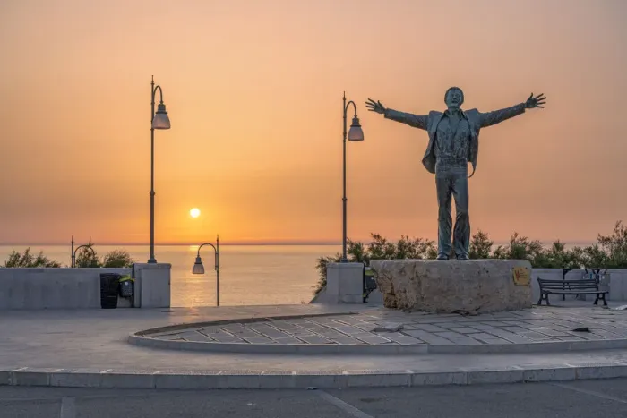 Framed Print : Polignano a Mare, bari, Apulia, Italy. Statue of Domenico Modugno at sunrise Framed Print : Polignano a Mare, bari, Apulia, Italy. Statue of Domenico Modugno at sunrise