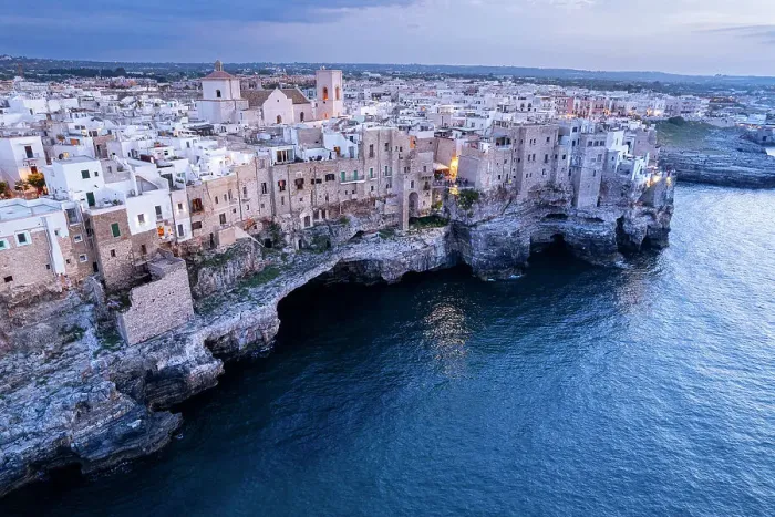 Framed Print : Polignano a mare at dusk, drone view, Polignano a Mare, Bari province, Apulia, Italy Framed Print : Polignano a mare at dusk, drone view, Polignano a Mare, Bari province, Apulia, Italy