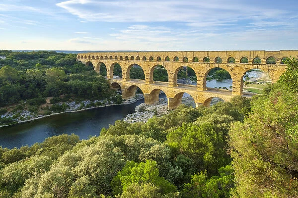 Pont du Gard Roman aqueduct over Gard River in late afternoon, Gard Department